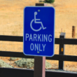 A disabled parking only sign.