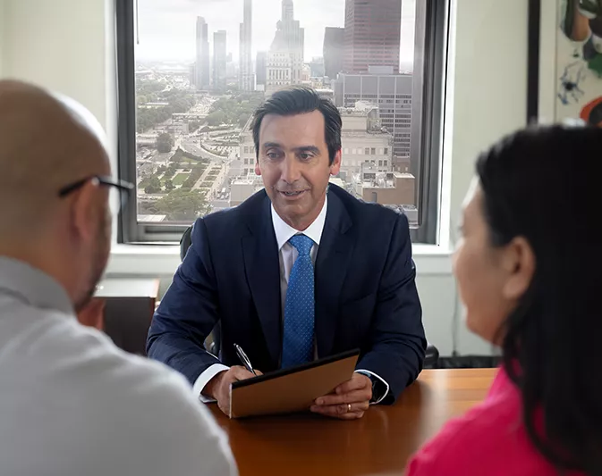 Chicago Disability attorney Lawrence Mabes meets with couple denied benefits